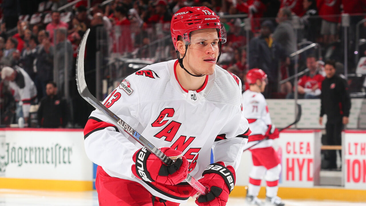 NEWARK, NJ - MAY 07: Jesse Puljujarvi #13 of the Carolina Hurricanes warms up prior to Game Three of the Second Round of the 2023 Stanley Cup Playoffs against the New Jersey Devils at the Prudential Center on May 7, 2023 in Newark, New Jersey.