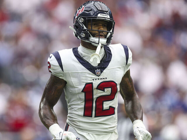 HOUSTON, TX - SEPTEMBER 17: Nico Collins #12 of the Houston Texans runs across the field during a football game against the Indianapolis Colts at NRG Stadium on September 17, 2023 in Houston, Texas.