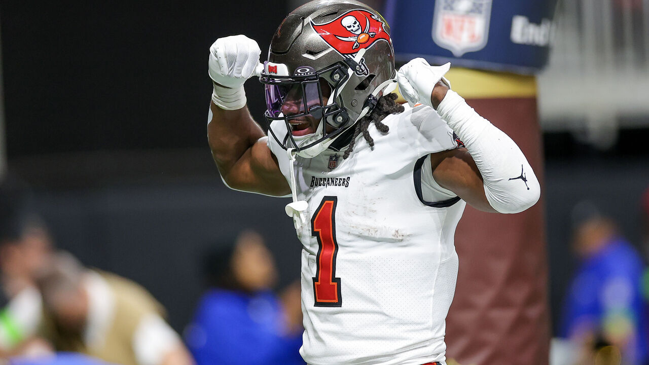 ATLANTA, GEORGIA - DECEMBER 10: Rachaad White #1 of the Tampa Bay Buccaneers reacts after rushing for a touchdown during the second half against the Atlanta Falcons at Mercedes-Benz Stadium on December 10, 2023 in Atlanta, Georgia.