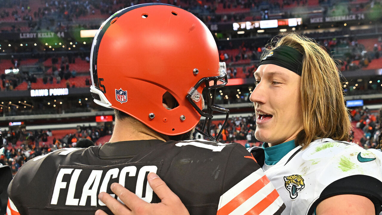 CLEVELAND, OHIO - DECEMBER 10: Joe Flacco #15 of the Cleveland Browns talks with Trevor Lawrence #16 of the Jacksonville Jaguars after the game at Cleveland Browns Stadium on December 10, 2023 in Cleveland, Ohio.