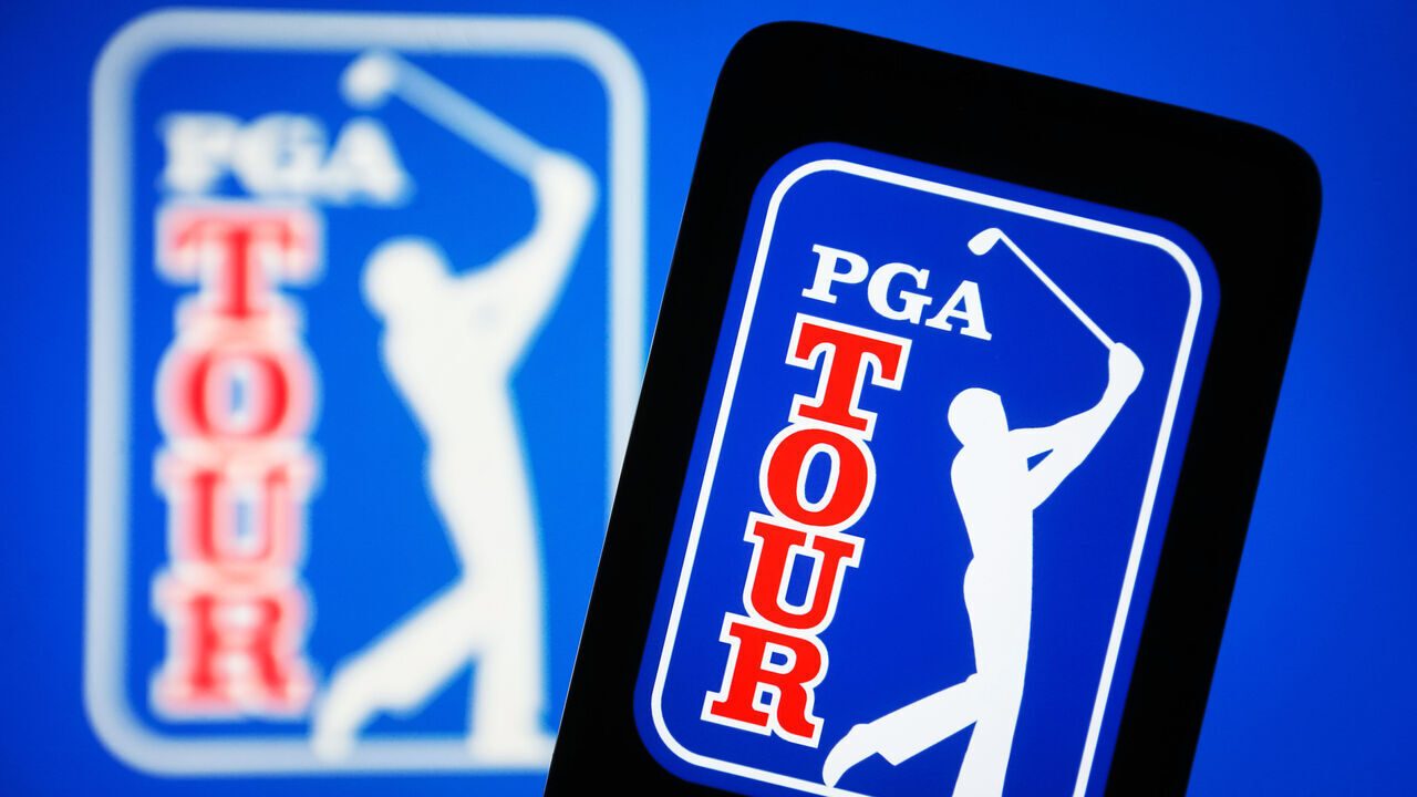 UKRAINE - 2023/10/21: In this photo illustration, the PGA Tour logo is seen displayed on a smartphone and on a pc screen. (Photo Illustration by Pavlo Gonchar/SOPA Images/LightRocket via Getty Images)