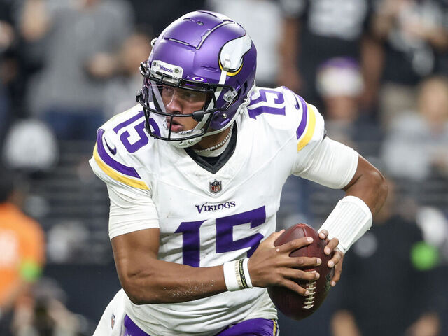 LAS VEGAS, NEVADA - DECEMBER 10: Joshua Dobbs #15 of the Minnesota Vikings carries the ball during the first half of the game against the Las Vegas Raiders at Allegiant Stadium on December 10, 2023 in Las Vegas, Nevada.