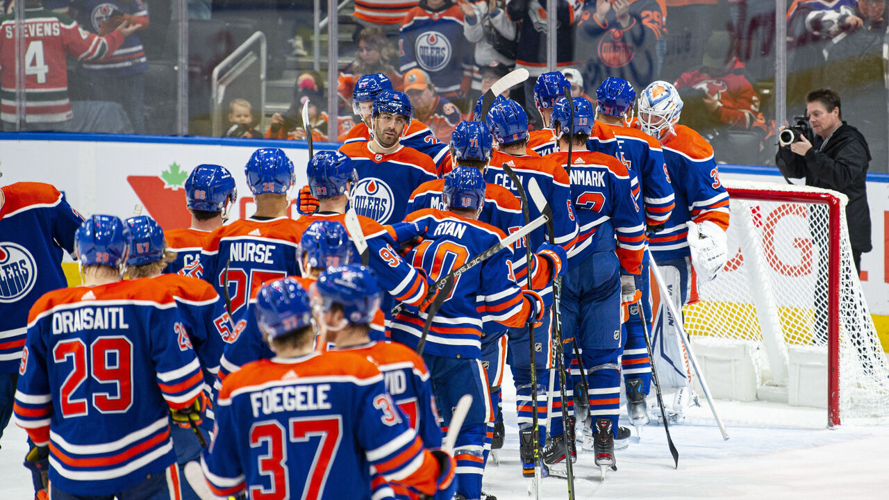EDMONTON, ALBERTA - DECEMBER 10: The Edmonton Oilers celebrate their win against the New Jersey Devils with Calvin Pickard #30 at Rogers Place on December 10, 2023 in Edmonton, Alberta, Canada.