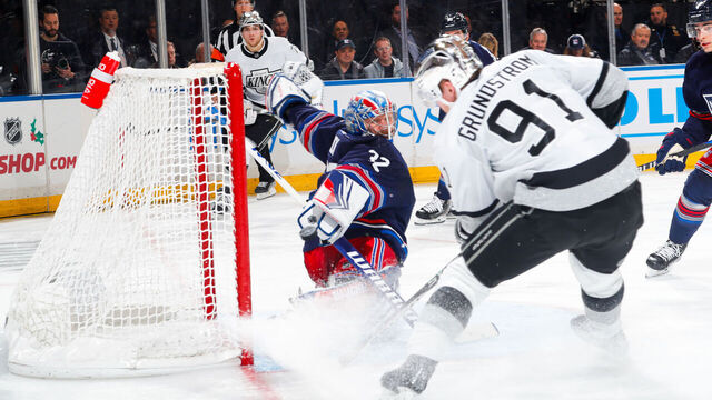 NEW YORK, NEW YORK - DECEMBER 10: Jonathan Quick #32 of the New York Rangers makes a save against Carl Grundstrom #91 of the Los Angeles Kings at Madison Square Garden on December 10, 2023 in New York City.