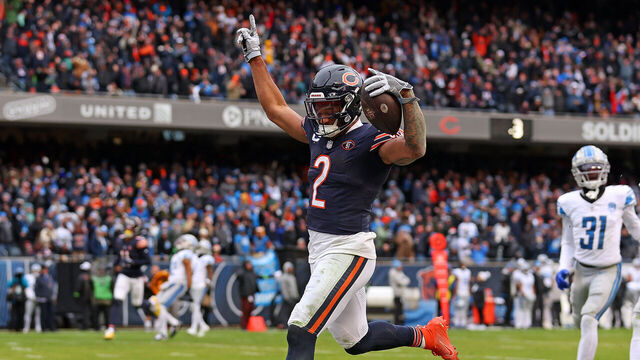 CHICAGO, ILLINOIS - DECEMBER 10: DJ Moore #2 of the Chicago Bears celebrates after a touchdown during the third quarter in the game against the Detroit Lions at Soldier Field on December 10, 2023 in Chicago, Illinois.