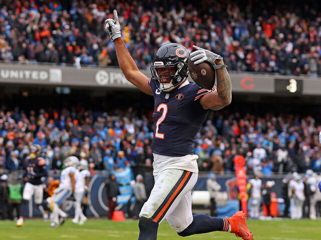 CHICAGO, ILLINOIS - DECEMBER 10: DJ Moore #2 of the Chicago Bears celebrates after a touchdown during the third quarter in the game against the Detroit Lions at Soldier Field on December 10, 2023 in Chicago, Illinois.