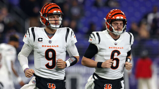 BALTIMORE, MARYLAND - NOVEMBER 16: Quarterbacks Joe Burrow #9 and Jake Browning #6 of the Cincinnati Bengals take the field before the start of the Bengals and Baltimore Ravens game at M&T Bank Stadium on November 16, 2023 in Baltimore, Maryland.