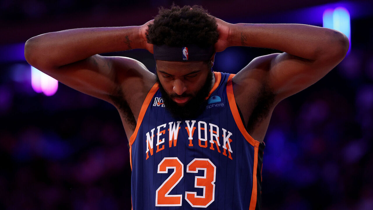NEW YORK, NEW YORK - NOVEMBER 28: Mitchell Robinson #23 of the New York Knicks reacts during the second half of an NBA In-Season Tournament game against the Charlotte Hornets at Madison Square Garden on November 28, 2023 in New York City. The New York Knicks defeated the Charlotte Hornets 115-91.