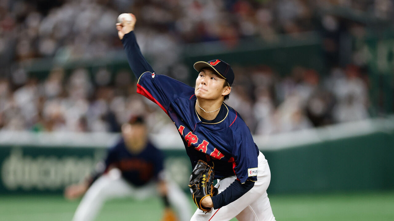 BUNKYO CITY, JAPAN - MARCH 12: Yoshinobu Yamamoto #18 of Team Japan pitches during Game 8 of Pool B between Team Japan and Team Australia at Tokyo Dome on Sunday, March 12, 2023 in Bunkyo City, Japan.