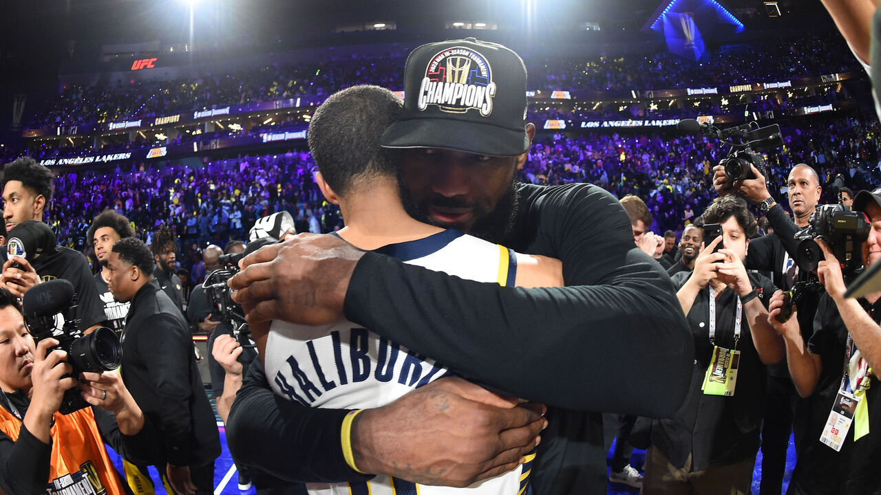 LAS VEGAS, NV - DECEMBER 9: LeBron James #23 of the Los Angeles Lakers and Tyrese Haliburton #0 of the Indiana Pacers embrace after the game during the In-Season Tournament Championship game on December 9, 2023 at T-Mobile Arena in Las Vegas, Nevada. Mandatory Copyright Notice: Copyright 2023 NBAE
