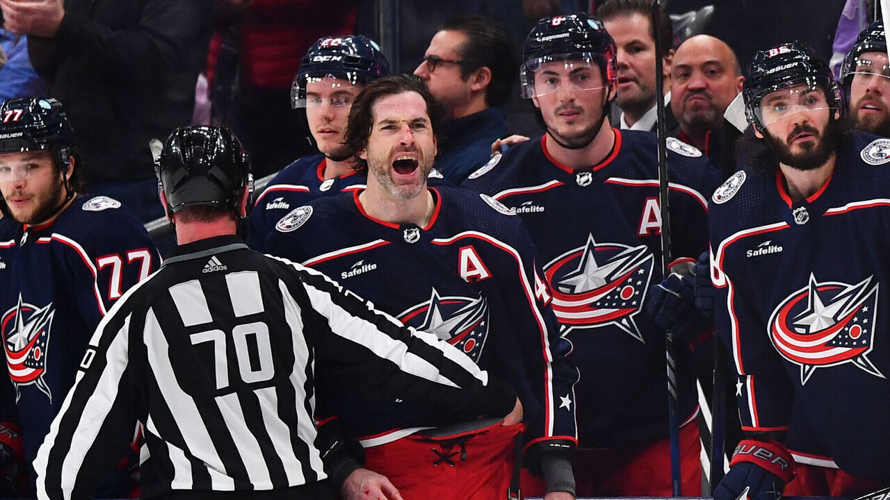 COLUMBUS, OHIO - DECEMBER 10: Erik Gudbranson #44 of the Columbus Blue Jackets shares words with Niko Mikkola #77 of the Florida Panthers during the third period of a game at Nationwide Arena on December 10, 2023 in Columbus, Ohio.