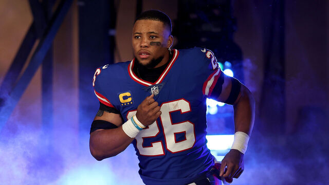 EAST RUTHERFORD, NEW JERSEY - DECEMBER 11: Saquon Barkley #26 of the New York Giants takes the field prior to the game against the Green Bay Packers during the first quarter in the game at MetLife Stadium on December 11, 2023 in East Rutherford, New Jersey.