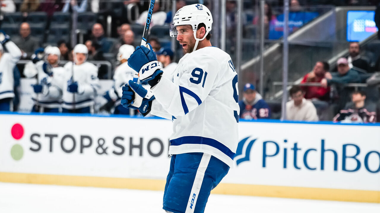 ELMONT, NEW YORK - DECEMBER 11: John Tavares #91 of the Toronto Maple Leafs celebrates a second period goal during the game vs. the New York Islanders at UBS Arena on December 11, 2023 in Elmont, New York.