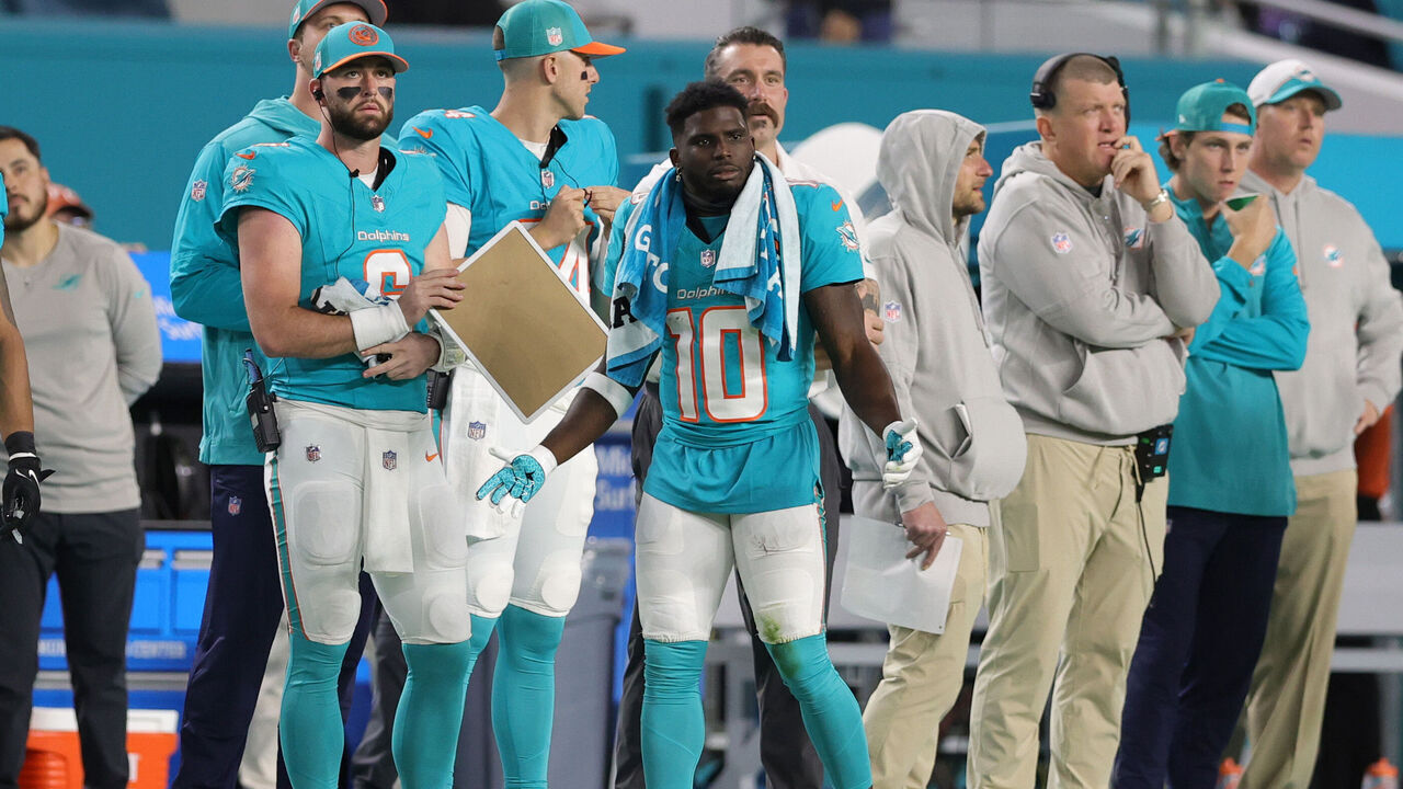 MIAMI GARDENS, FLORIDA - DECEMBER 11: Tyreek Hill #10 of the Miami Dolphins reacts on the sidelines in the first half against the Tennessee Titans at Hard Rock Stadium on December 11, 2023 in Miami Gardens, Florida.