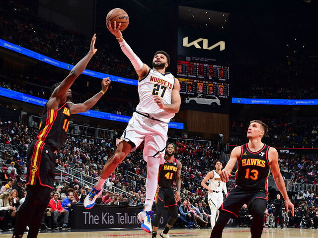 ATLANTA, GA - DECEMBER 11: Jamal Murray #27 of the Denver Nuggets shoots the ball during the game against the Atlanta Hawks on December 11, 2023 at State Farm Arena in Atlanta, Georgia. NOTE TO USER: User expressly acknowledges and agrees that, by downloading and/or using this Photograph, user is consenting to the terms and conditions of the Getty Images License Agreement. Mandatory Copyright Notice: Copyright 2023 NBAE