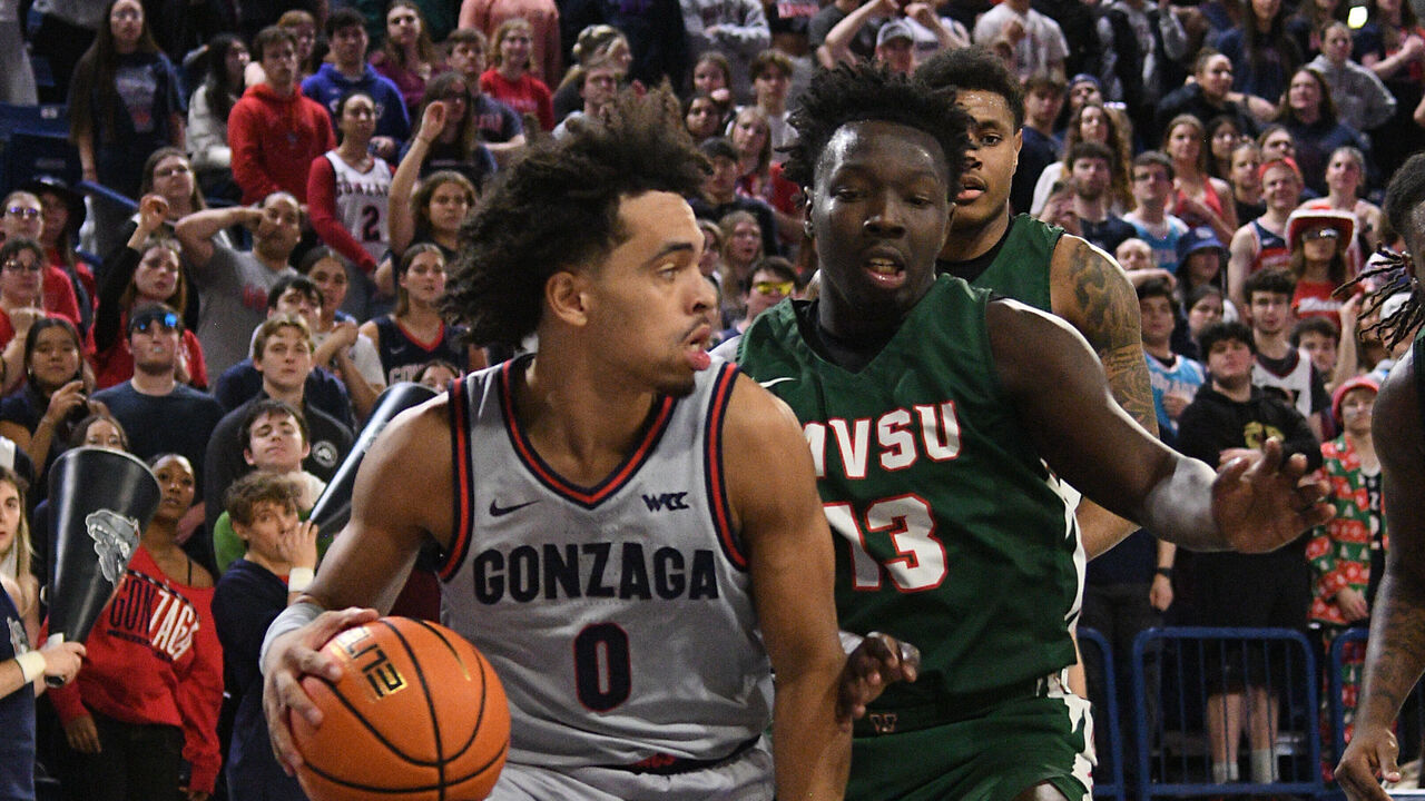 SPOKANE, WA - DECEMBER 11: Ryan Nembhard #0 of the Gonzaga Bulldogs handles the ball as Darrius Clark #13 of the Mississippi Valley State Delta Devils defends during the first half at McCarthey Athletic Center on December 11, 2023 in Spokane, Washington.