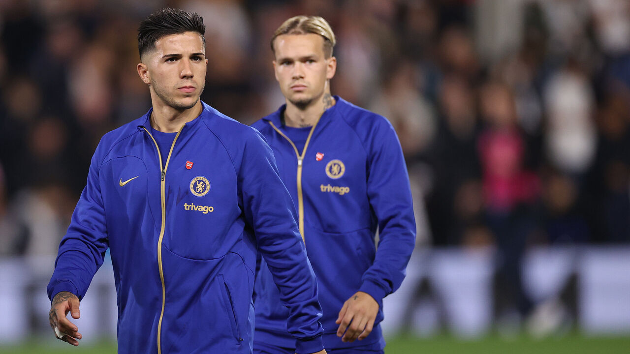 LONDON, ENGLAND - OCTOBER 02: Enzo Fernandez of Chelsea and Mykhailo Mudryk of Chelsea walk out onto the pitch during the Premier League match between Fulham FC and Chelsea FC at Craven Cottage on October 02, 2023 in London, England.