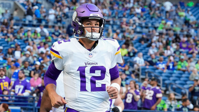 SEATTLE, WASHINGTON - AUGUST 10: Quarterback Nick Mullens #12 of the Minnesota Vikings runs out on to the field before a preseason game against the Seattle Seahawks at Lumen Field on August 10, 2023 in Seattle, Washington.