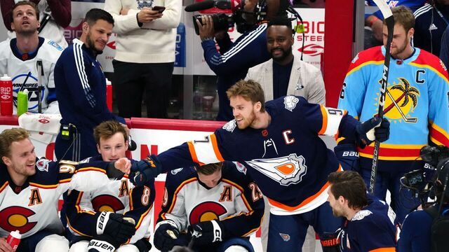 SUNRISE, FLORIDA - FEBRUARY 03: Connor McDavid #97 of the Edmonton Oilers fist bumps with Mikko Rantanen #96 of the Colorado Avalanche during the Honda NHL Accuracy Shooting event during the 2023 NHL All-Star Skills Competition at FLA Live Arena on February 03, 2023 in Sunrise, Florida.