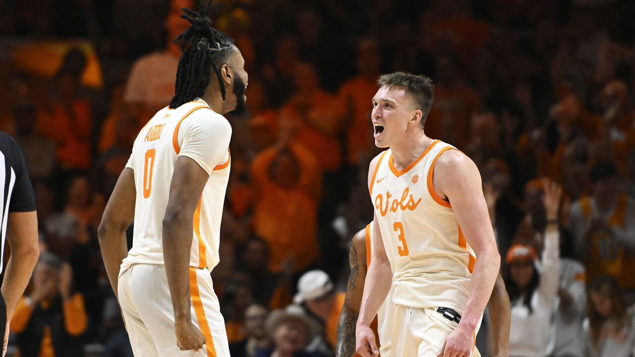KNOXVILLE, TENNESSEE - DECEMBER 09: Jonas Aidoo #0 and Dalton Knecht #3 of the Tennessee Volunteers celebrate against the Illinois Fighting Illini in the second half at Thompson-Boling Arena on December 09, 2023 in Knoxville, Tennessee.