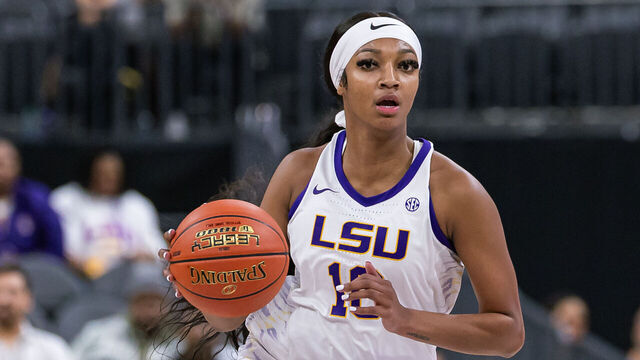 LAS VEGAS, NEVADA - NOVEMBER 6: Angel Reese #10 of the LSU Lady Tigers brings the ball up court during the game against the Colorado Buffaloes in the Naismith Hall of Fame Series at T-Mobile Arena on November 6, 2023 in Las Vegas, Nevada.