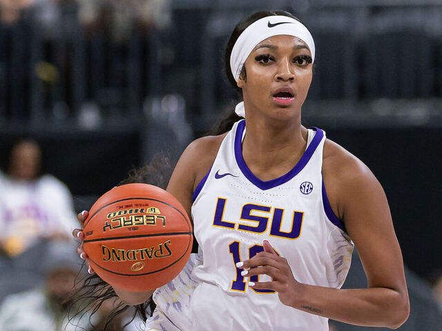 LAS VEGAS, NEVADA - NOVEMBER 6: Angel Reese #10 of the LSU Lady Tigers brings the ball up court during the game against the Colorado Buffaloes in the Naismith Hall of Fame Series at T-Mobile Arena on November 6, 2023 in Las Vegas, Nevada.