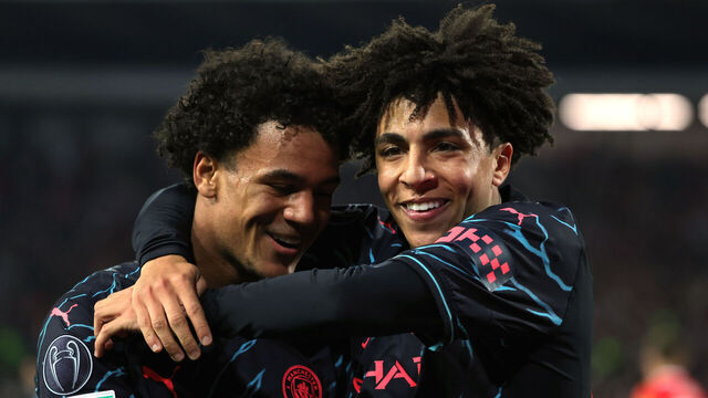 BELGRADE, SERBIA - DECEMBER 13: Oscar Bobb of Manchester City celebrates with teammate, Rico Lewis after scoring their team's second goal during the UEFA Champions League match between FK Crvena zvezda and Manchester City at Stadion Rajko Mitić on December 13, 2023 in Belgrade, Serbia.