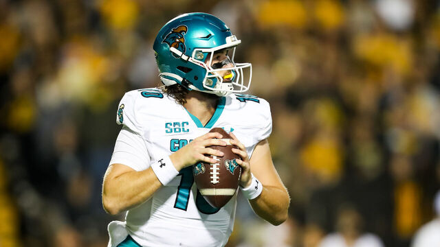 BOONE, NC - OCTOBER 10: Grayson McCall #10 of the Coastal Carolina Chanticleers looks to pass the ball during a football game against the Appalachian State Mountaineers at Kidd Brewer Stadium in Boone, North Carolina on Oct 10, 2023.