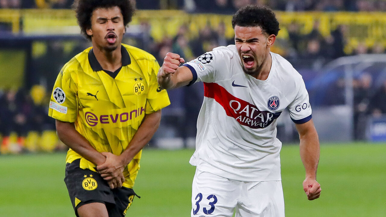 DORTMUND, GERMANY - DECEMBER 13: Warren Zaire-Emery of Paris Saint-Germain celebrates after scoring his teams 1:1 goal during the UEFA Champions League match between Borussia Dortmund and Paris Saint-Germain at Signal Iduna Park on December 13, 2023 in Dortmund, Germany.