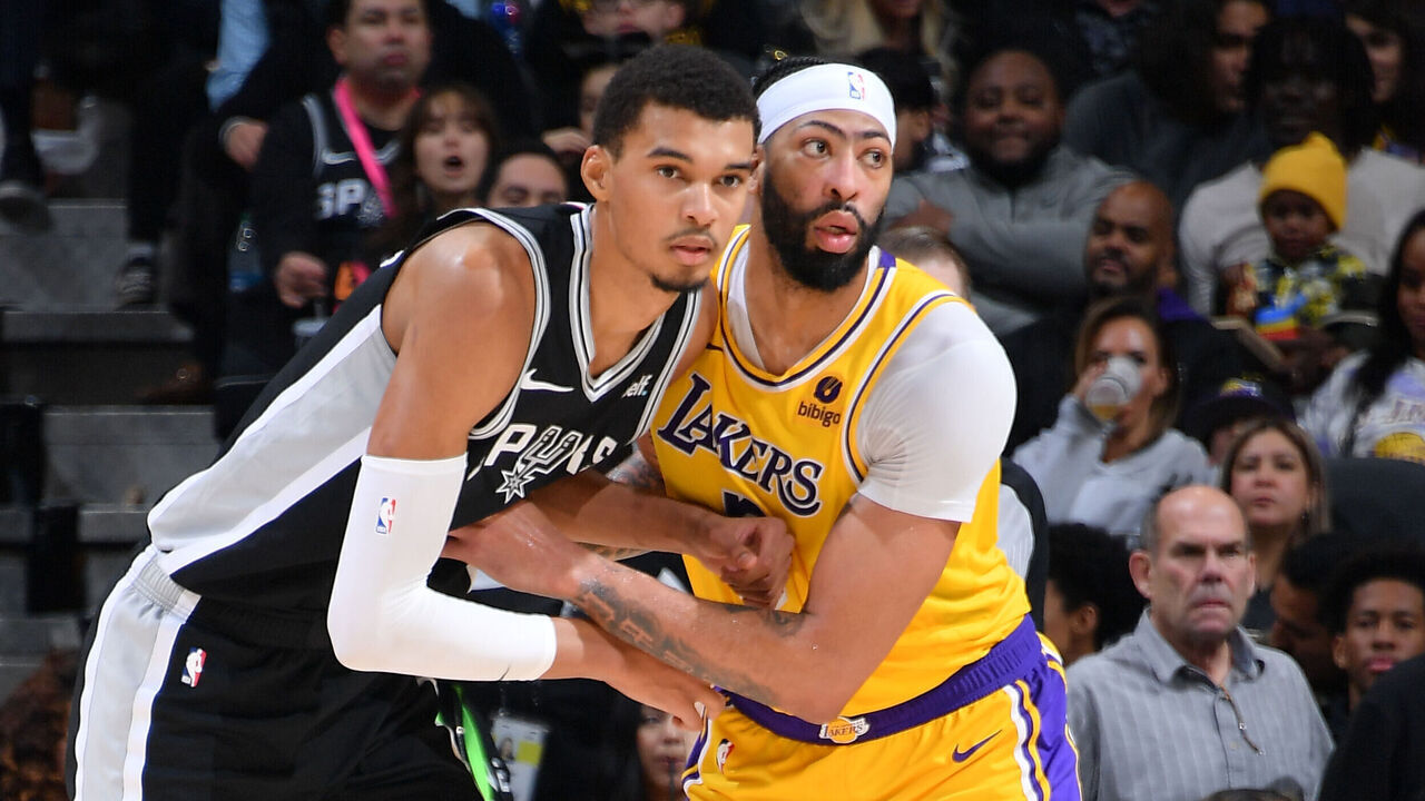 SAN ANTONIO, TX - DECEMBER 13: Victor Wembanyama #1 of the San Antonio Spurs and Anthony Davis #3 of the Los Angeles Lakers play defense during the game on December 13, 2023 at the Frost Bank Center in San Antonio, Texas. Mandatory Copyright Notice: Copyright 2023 NBAE (Photos by Michael Gonzales/NBAE via Getty Images)
