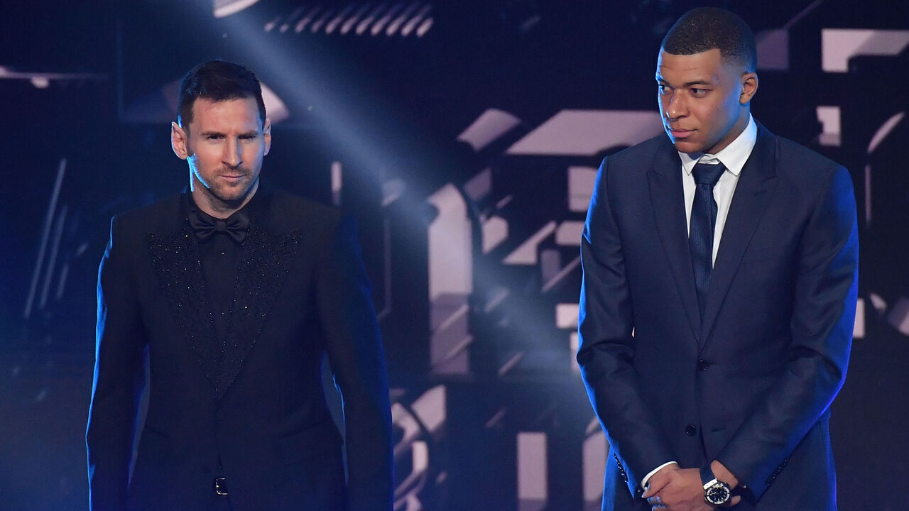 PARIS, FRANCE - FEBRUARY 27: Lionel Messi and Kylian Mbappé on stage during The Best FIFA Football Awards 2022 on February 27, 2023 in Paris, France