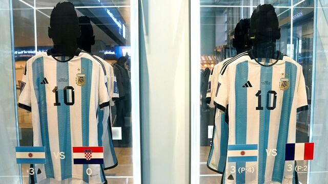 The shirt worn in the 2022 World Cup semi-final match between Argentina and Croatia on December 13, 2022 (L), and the shirt worn in the 2022 World Cup final match between Argentina and France on December 18, 2022 (R), are displayed during a Sotheby's auction media preview of six 2022 FIFA World Cup match-worn shirts belonging to Inter Miami's Argentine forward #10 Lionel Messi, in New York City on November 30, 2023. The auction, which includes shirts worn in the final, semi-final, quarter-final, round of 16, and key group stage matches, is open for bidding from November 30, 2023, to December 14, 2023.