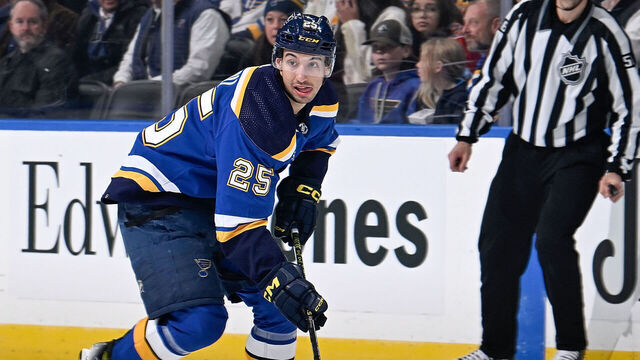 ST. LOUIS, MO - DECEMBER 14: Jordan Kyrou #25 of the St. Louis Blues controls the puck against the Ottawa Senators on December 14, 2023 at the Enterprise Center in St. Louis, Missouri.
