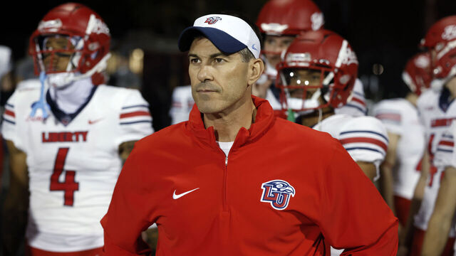 BOWLING GREEN, KY - OCTOBER 24: Liberty Flames head coach Jamey Chadwell stands with his team before a college football game against the Western Kentucky Hilltoppers on October 24, 2023 at Houchens Industries - L. T. Smith Stadium in Bowling Green, Kentucky.