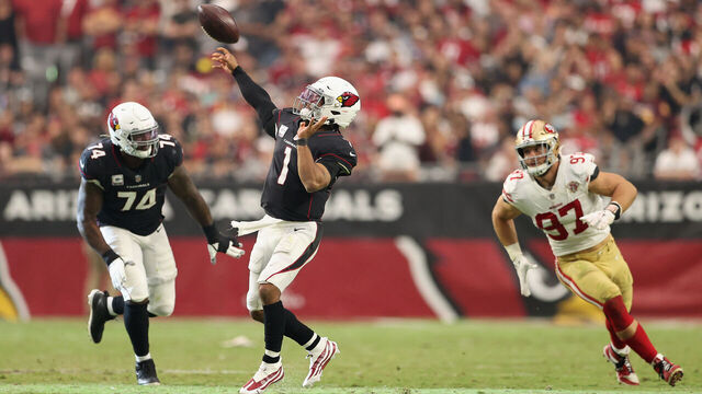 GLENDALE, ARIZONA - OCTOBER 10: Quarterback Kyler Murray #1 of the Arizona Cardinals throws a deep pass ahead of defensive end Nick Bosa #97 of the San Francisco 49ers during the second half of the NFL game at State Farm Stadium on October 10, 2021 in Glendale, Arizona. The Cardinals defeated the 49ers 17-10.