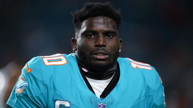 MIAMI GARDENS, FLORIDA - DECEMBER 11: Tyreek Hill #10 of the Miami Dolphins warms up prior to a game against the Tennessee Titans at Hard Rock Stadium on December 11, 2023 in Miami Gardens, Florida.