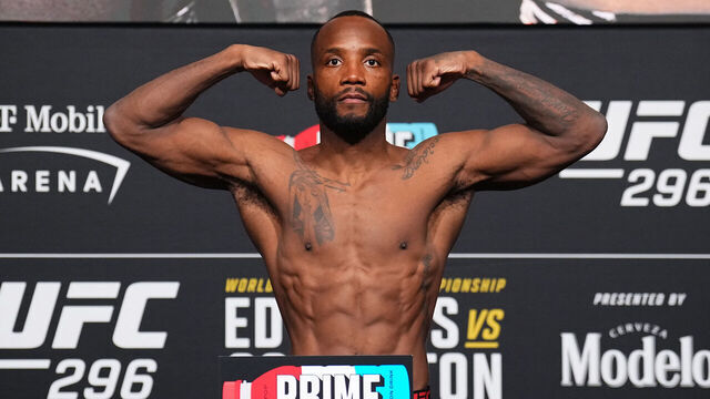 LAS VEGAS, NEVADA - DECEMBER 15: Leon Edwards of Jamaica poses on the scale during the UFC 296 official weigh-in at UFC APEX on December 15, 2023 in Las Vegas, Nevada.