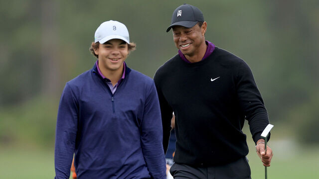 ORLANDO, FLORIDA - DECEMBER 15: Tiger Woods of the United States walks with his son Charlie Woods during the Friday pro-am as a preview for the PNC Championship at The Ritz-Carlton Golf Club on December 15, 2023 in Orlando, Florida.
