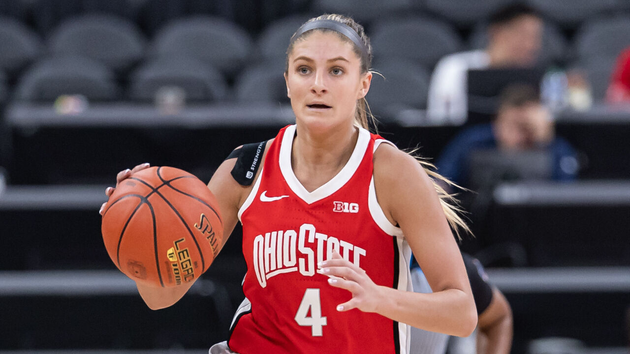 LAS VEGAS, NEVADA - NOVEMBER 6: Jacy Sheldon #4 of the Ohio State Buckeyes brings the ball up court during the game against the USC Trojans during the Naismith Hall of Fame Series at T-Mobile Arena on November 6, 2023 in Las Vegas, Nevada.