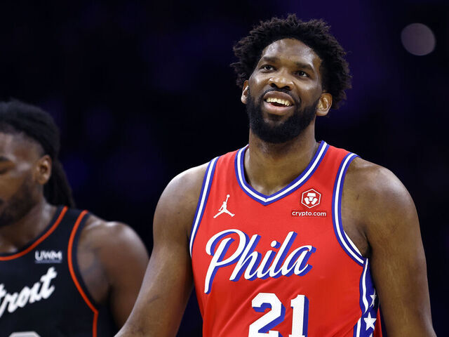 PHILADELPHIA, PENNSYLVANIA - DECEMBER 15: Joel Embiid #21 of the Philadelphia 76ers reacts during the first quarter against the Detroit Pistons at the Wells Fargo Center on December 15, 2023 in Philadelphia, Pennsylvania.