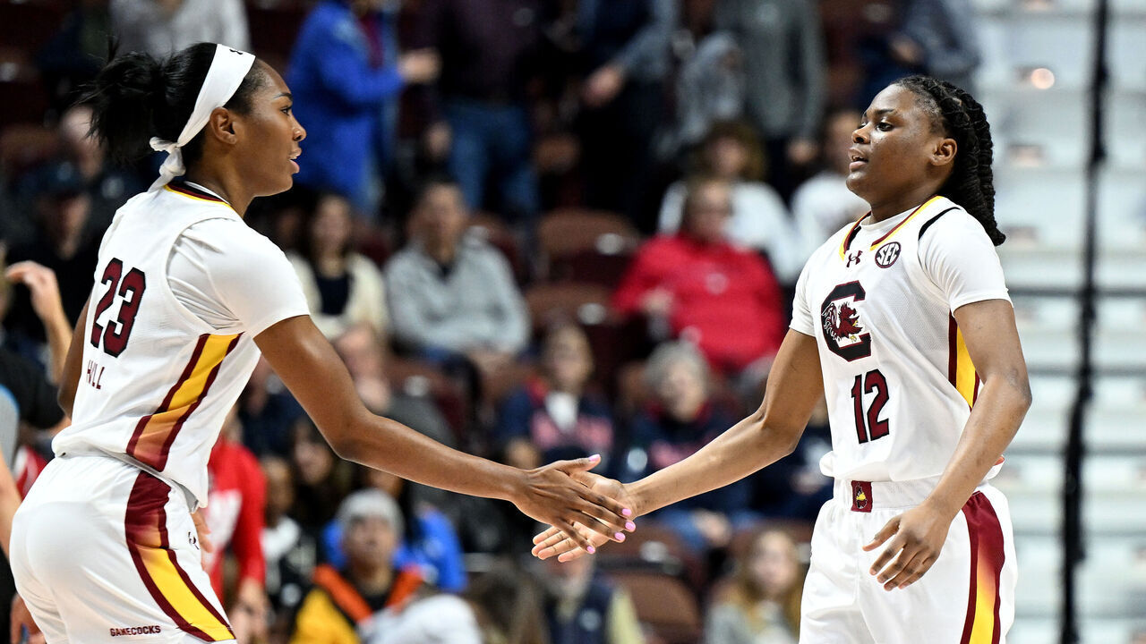 UNCASVILLE, CONNECTICUT - DECEMBER 10: MiLaysia Fulwiley #12 of the South Carolina Gamecocks celebrates with Bree Hall #23 during the game against the Utah Utes at Mohegan Sun Arena on December 10, 2023 in Uncasville, Connecticut.