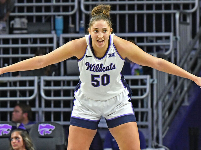 MANHATTAN, KS - NOVEMBER 19: Ayoka Lee #50 of the Kansas State Wildcats gets set on defense against the Wisconsin Badgers in the second half at Bramlage Coliseum on November 19, 2023 in Manhattan, Kansas.