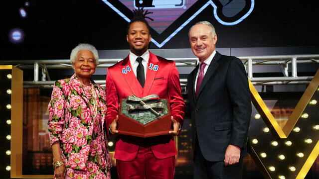 LAS VEGAS, NV - DECEMBER 16: Ronald Acuna Jr. poses for a photo after accepting the Hank Aaron award during the All-MLB Team Show presented by MGM Rewards at HyperX Arena on Saturday, December 16, 2023 in Las Vegas, Nevada.