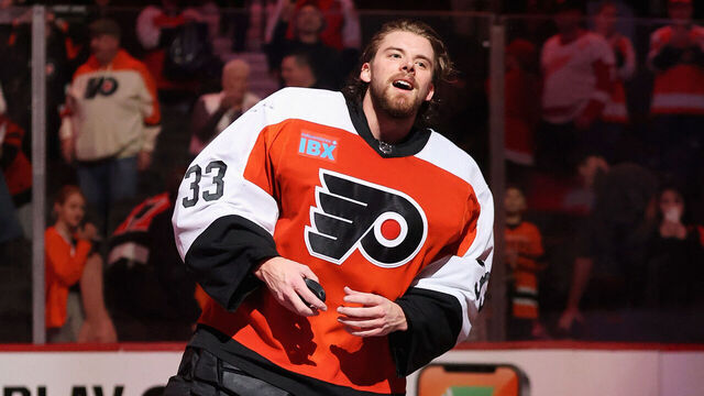 PHILADELPHIA, PENNSYLVANIA - DECEMBER 16: Samuel Ersson #33 of the Philadelphia Flyers skates onto the ice to acknowledge the crowd after defeating the Detroit Red Wings 1-0 at the Wells Fargo Center on December 16, 2023 in Philadelphia, Pennsylvania.