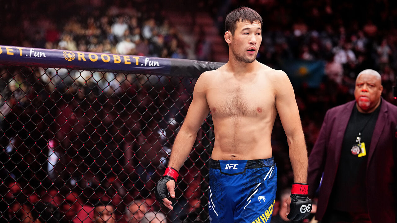LAS VEGAS, NEVADA - DECEMBER 16: Shavkat Rakhmonov of Uzbekistan enters the Octagon in a welterweight fight during the UFC 296 event at T-Mobile Arena on December 16, 2023 in Las Vegas, Nevada.