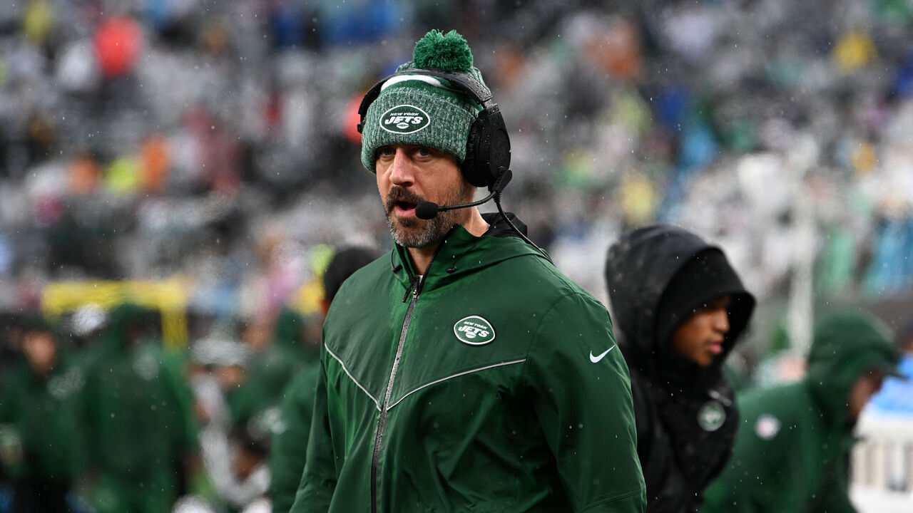 EAST RUTHERFORD, NJ - DECEMBER 10: New York Jets QB Aaron Rodgers watches action during game featuring the Houston Texans and the New York Jets on December 10, 2023 at MetLife Stadium in East Rutherford, NJ.