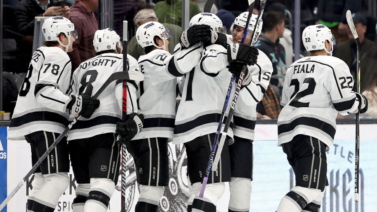 SEATTLE, WASHINGTON - DECEMBER 16: The Los Angeles Kings celebrate after beating the Seattle Kraken in a shootout at Climate Pledge Arena on December 16, 2023 in Seattle, Washington.