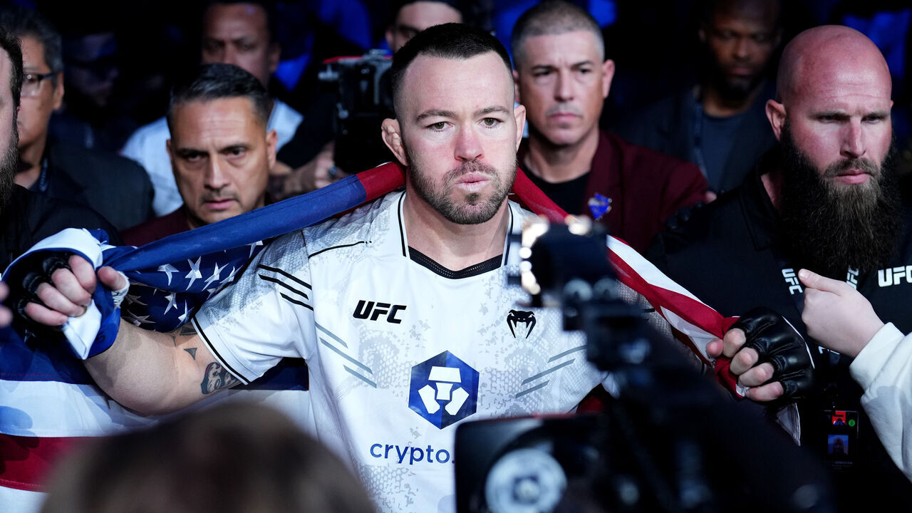 LAS VEGAS, NEVADA - DECEMBER 16: Colby Covington walks to the Ocatagon in the UFC welterweight championship fight during the UFC 296 event at T-Mobile Arena on December 16, 2023 in Las Vegas, Nevada.