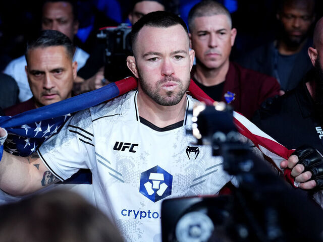 LAS VEGAS, NEVADA - DECEMBER 16: Colby Covington walks to the Ocatagon in the UFC welterweight championship fight during the UFC 296 event at T-Mobile Arena on December 16, 2023 in Las Vegas, Nevada.