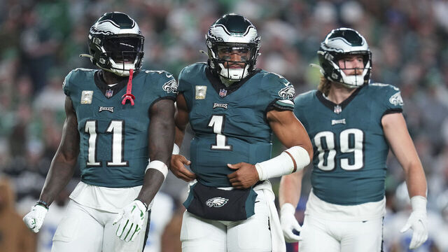 PHILADELPHIA, PENNSYLVANIA - NOVEMBER 5: A.J. Brown #11, Jalen Hurts #1, and Jack Stoll #89 of the Philadelphia Eagles look on against the Dallas Cowboys at Lincoln Financial Field on November 5, 2023 in Philadelphia, Pennsylvania.